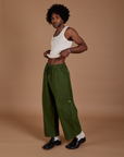 Drop Pocket Cargo Pants in Evergreen angled front view on Jerrod