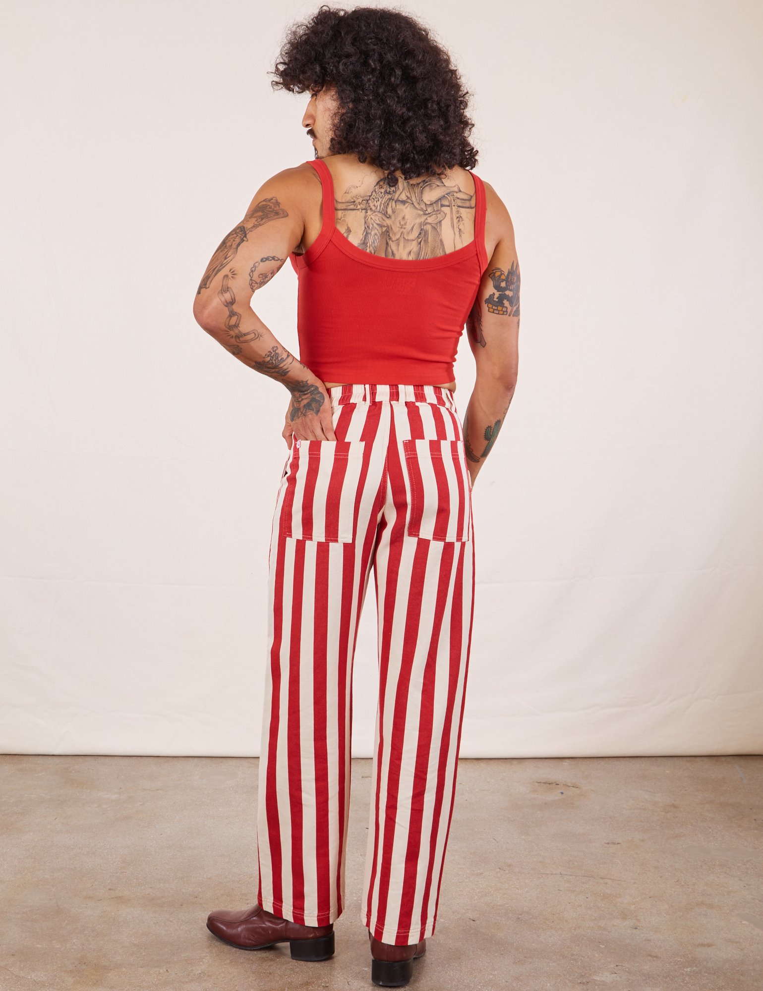 Back view of Work Pants in Cherry Stripe and mustang red Cropped Cami on Jesse