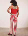 Back view of Work Pants in Cherry Stripe and mustang red Cropped Cami on Jesse