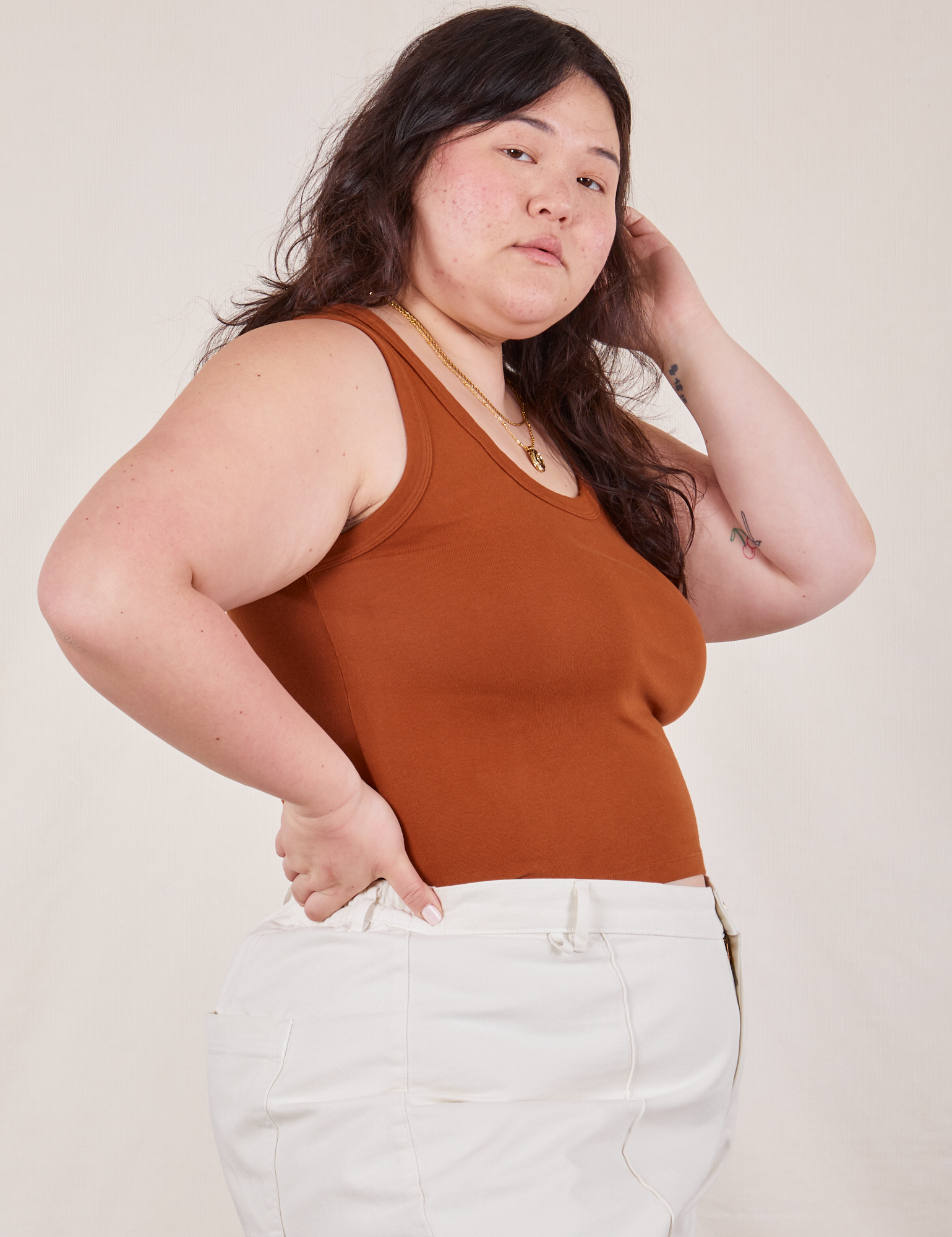 The Tank Top in Burnt Terracotta side view on Ashley