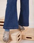 Indigo Wide Leg Trousers in Dark Wash pant leg close up on Jerrod