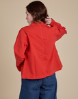 Denim Work Jacket in Mustang Red back view on Hana