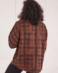 Plaid Flannel Overshirt in Fudgesicle Brown back view on Jesse