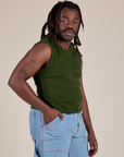 Angled front view of Muscle Tee in Evergreen on Demi