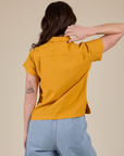 Pantry Button-Up in Mustard Yellow back view on Alex