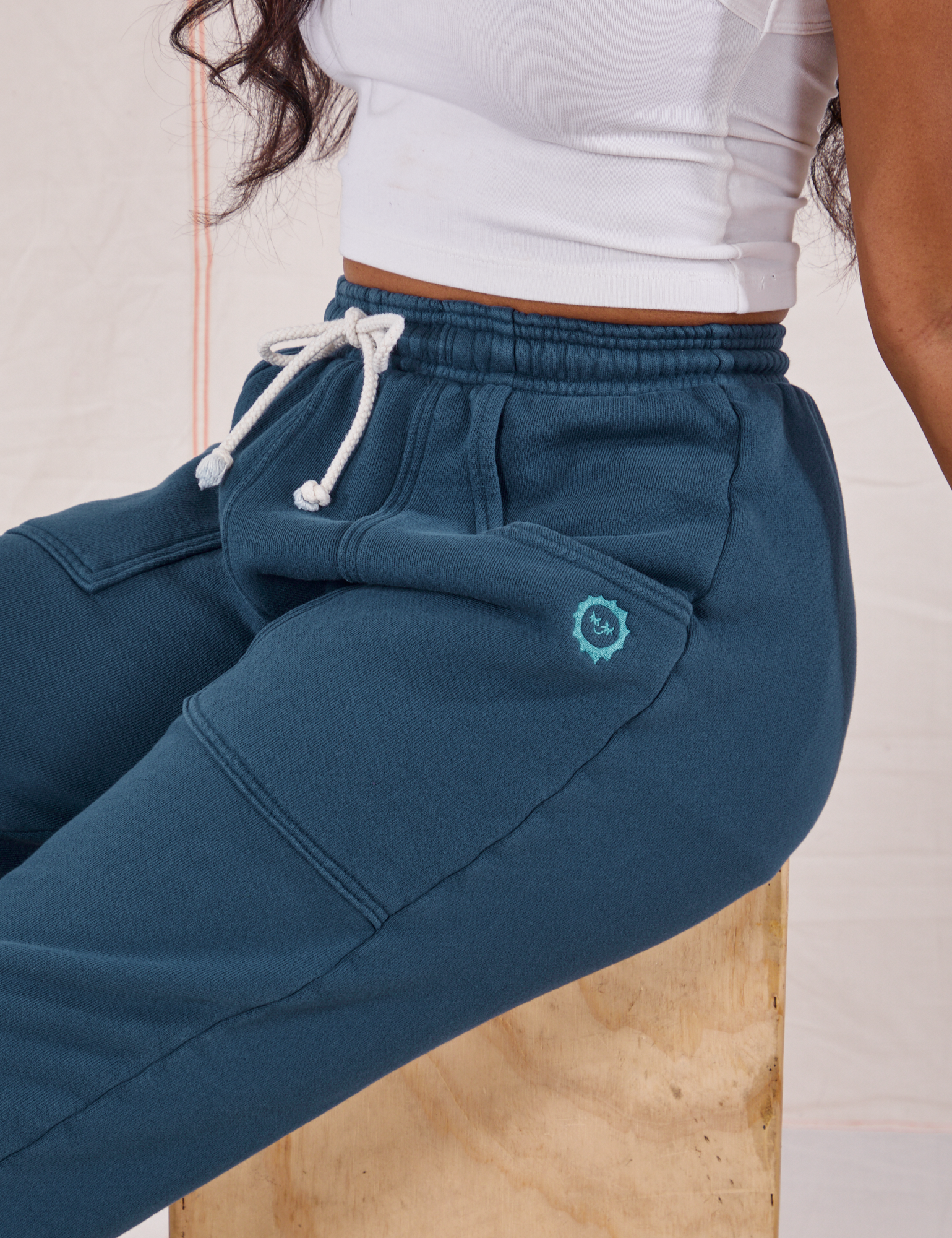 Rolled Cuff Sweat Pants in Lagoon side close up on Kandia