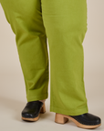 Work Pants in Gross Green pant leg close up on Ashley