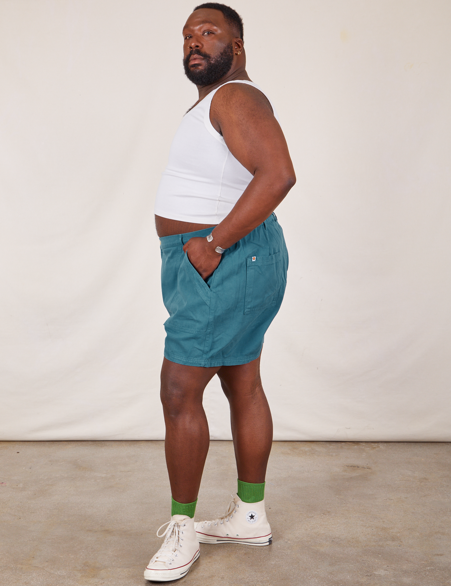 Side view of Classic Work Shorts in Marine Blue and Tank Top in vintage tee off-white on Elijah