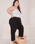 Side view of Heritage Trousers in Basic Black worn by Ashley