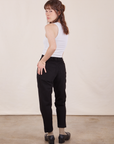 Back view of Petite Pencil Pants in Basic Black and Cropped Tank Top in vintage tee off-white on Hana