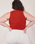 Back view of Tank Top in Mustang Red tucked into vintage tee off-white Western Pants on Ashley