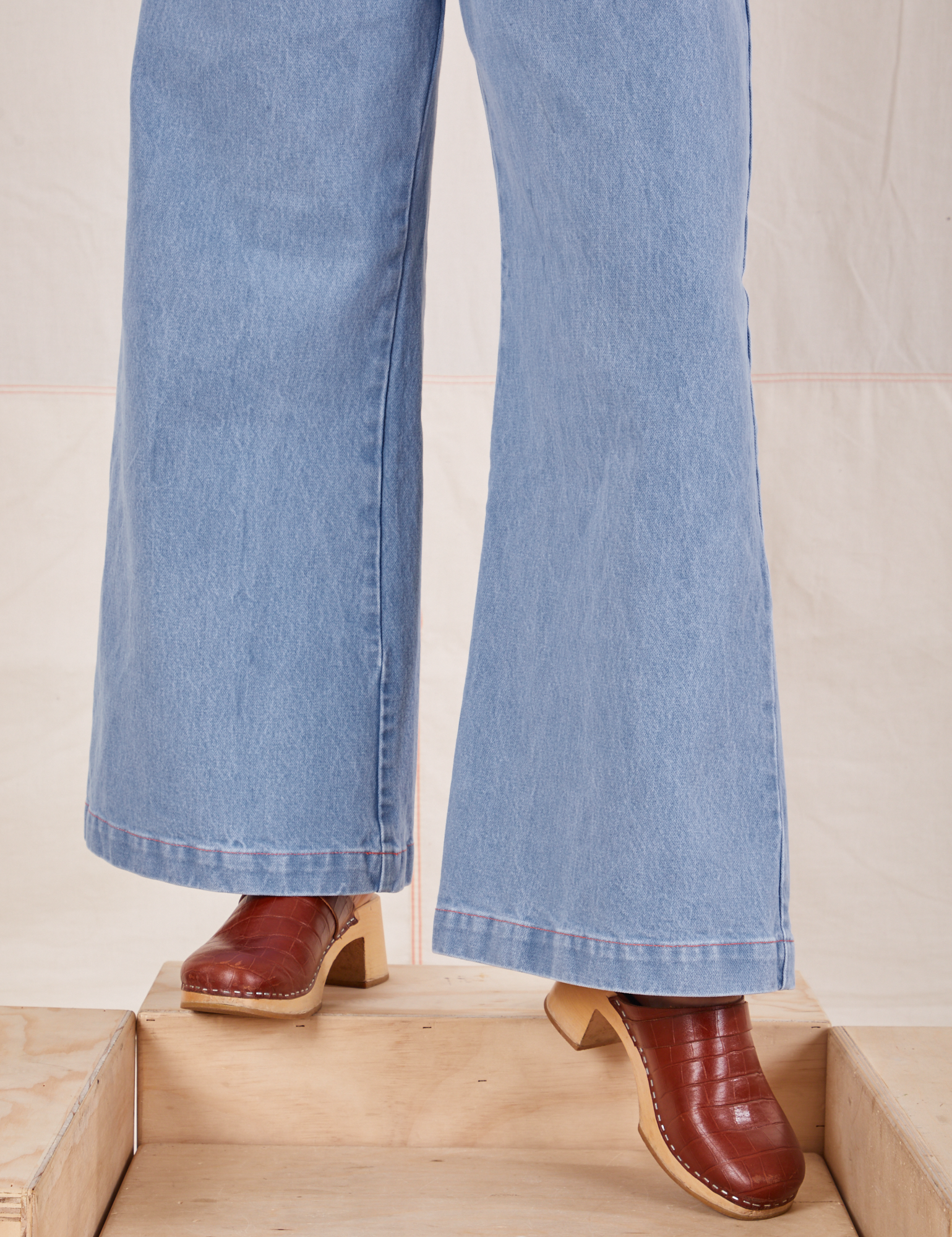 Indigo Wide Leg Trousers in Light Wash pant leg close up on Betty