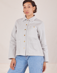 Tiara is wearing a buttoned up Denim Work Jacket in Dishwater White