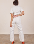 Back pocket close up of Short Sleeve Jumpsuit in Vintage Tee Off-White worn by Tiara