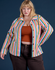 Juliet is 5’7” and wearing L Stripe Work Jacket in Rainbow Stripe