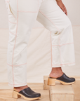 Carpenter Jeans in Vintage Tee Off-White pant side view close up on Meghna