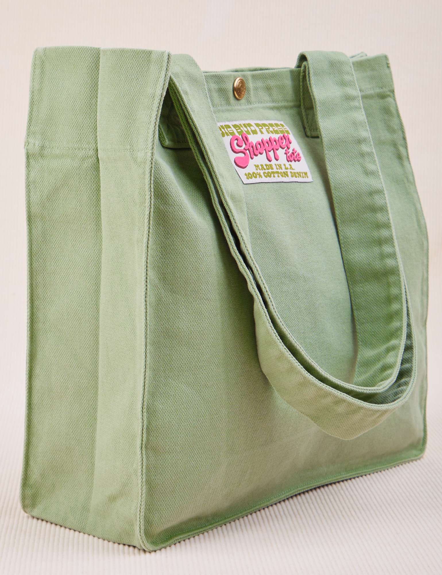 Angled view of Shopper Tote Bag in Sage Green