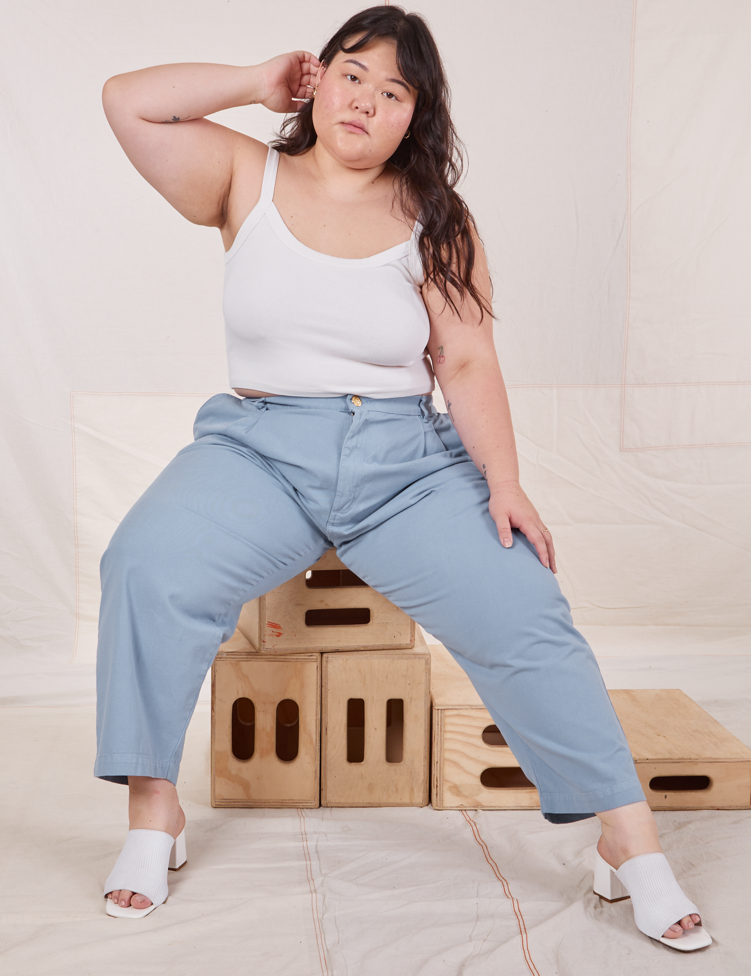 Ashley is wearing Heavyweight Trousers in Periwinkle and Cropped Cami in vintage tee off-white
