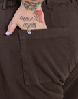 Close up of Sam's hand in the back pocket of Work Pants in Espresso Brown