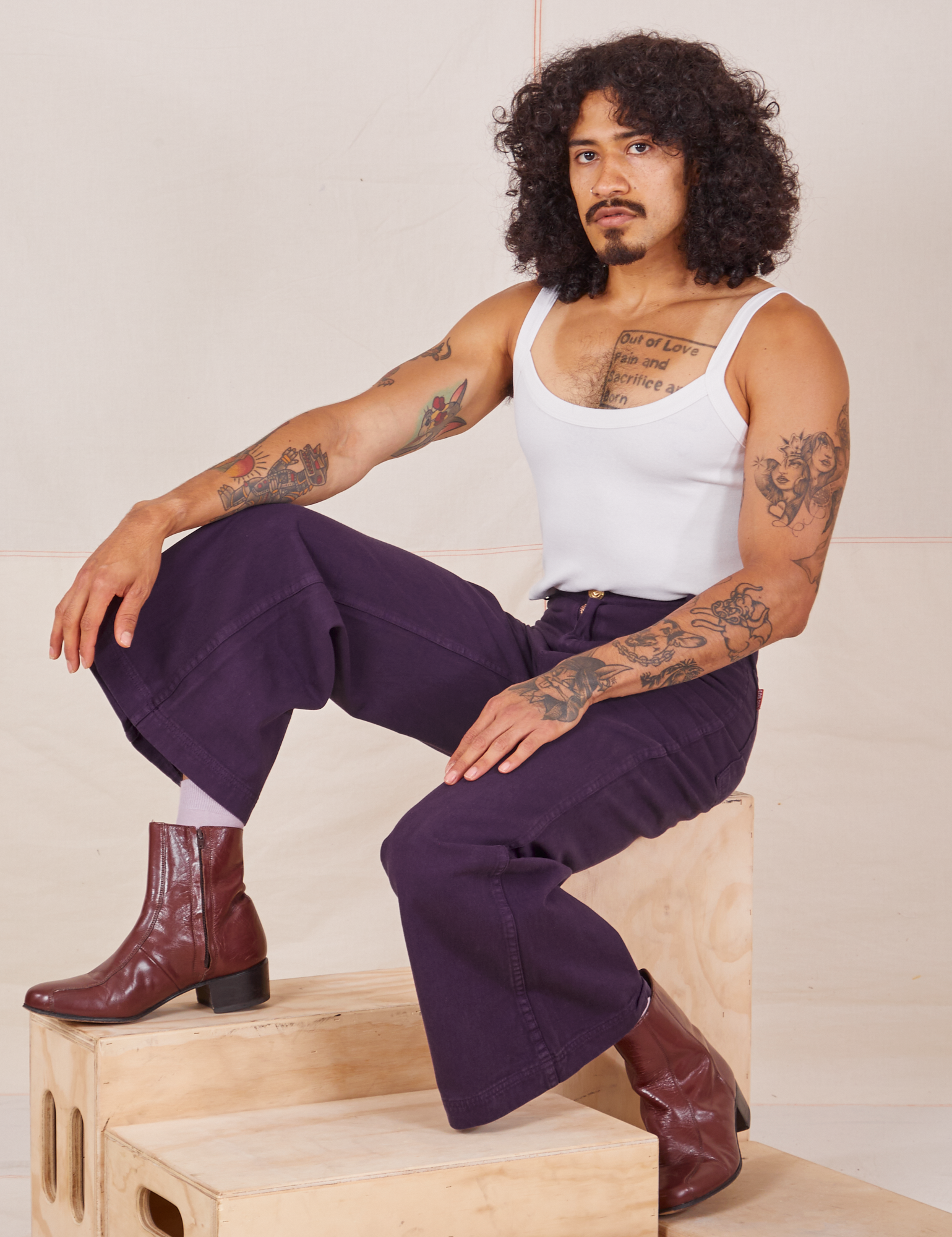 Jesse is wearing Bell Bottoms in Nebula Purple and vintage off-white Cami