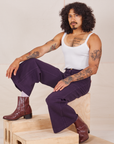Jesse is wearing Bell Bottoms in Nebula Purple and Cropped Cami in vintage tee off-white