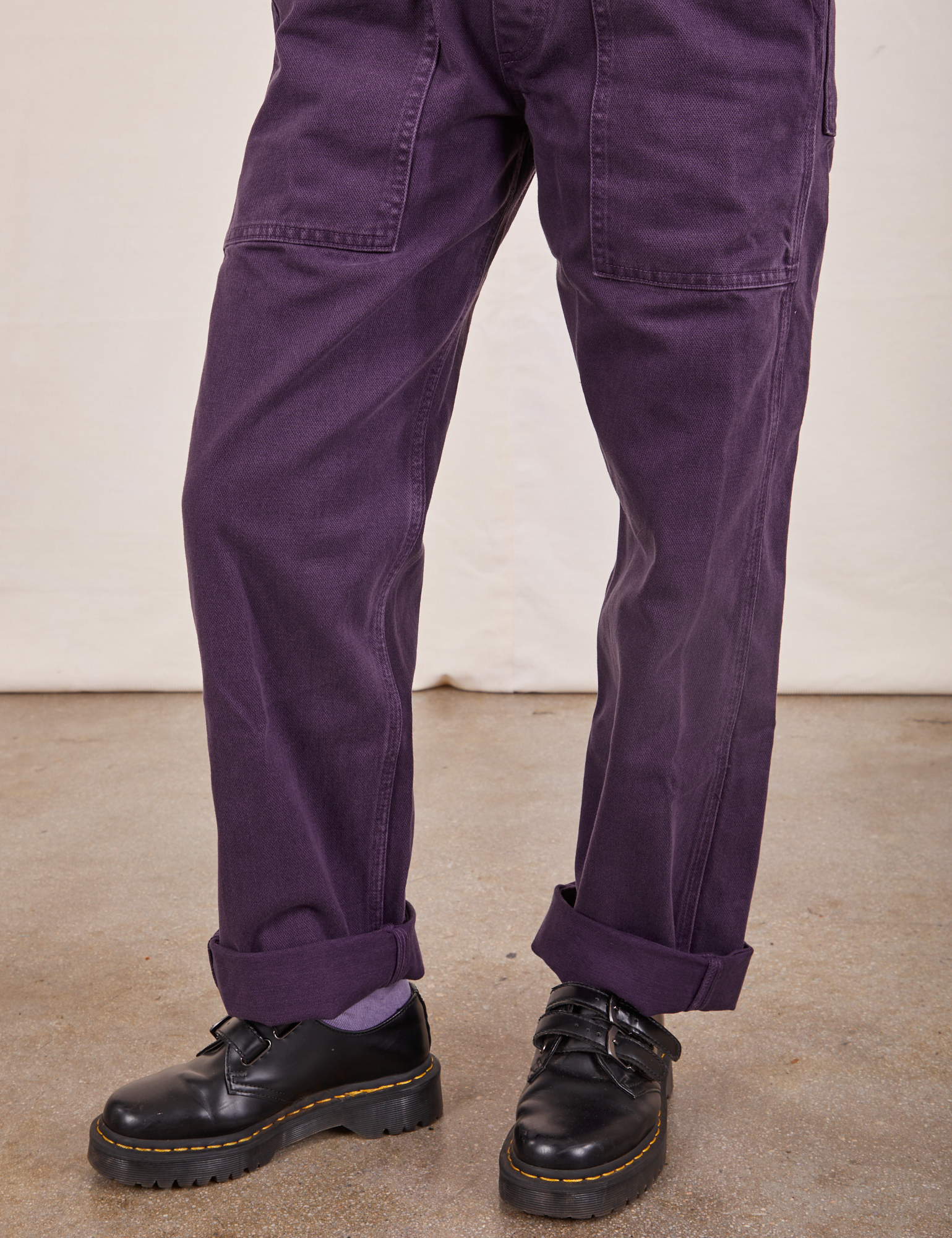 Pant leg close up of Original Overalls in Mono Nebula Purple worn by Hana