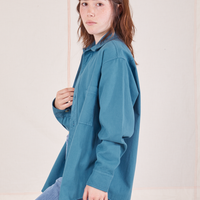 Side view of Oversize Overshirt in Marine Blue worn by Hana