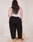 Back view of Heritage Trousers in Basic Black worn by Ashley