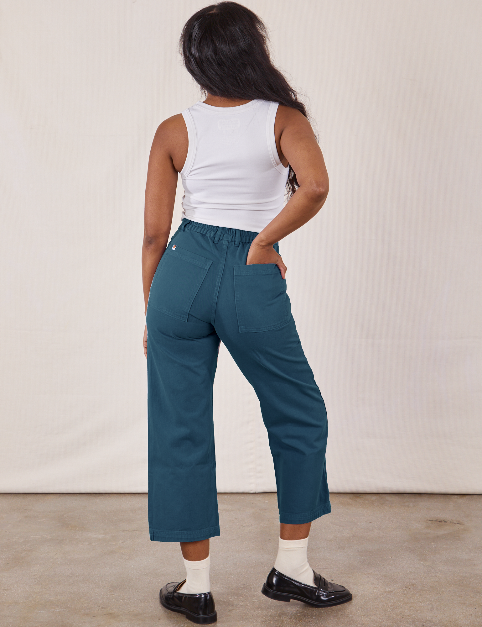 Back view of Petite Work Pants in Lagoon and vintage tee off-white Cropped Tank