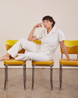 Tiara is wearing Short Sleeve Jumpsuit in Vintage Tee Off-White
