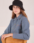 Scarlett is wearing Wide Brim Denim Bucket Hat