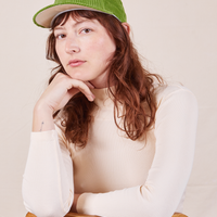 Dugout Corduroy Hat in Bright Olive worn by Alex