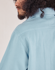 Back shoulder close up of Flannel Overshirt in Baby Blue on Jesse