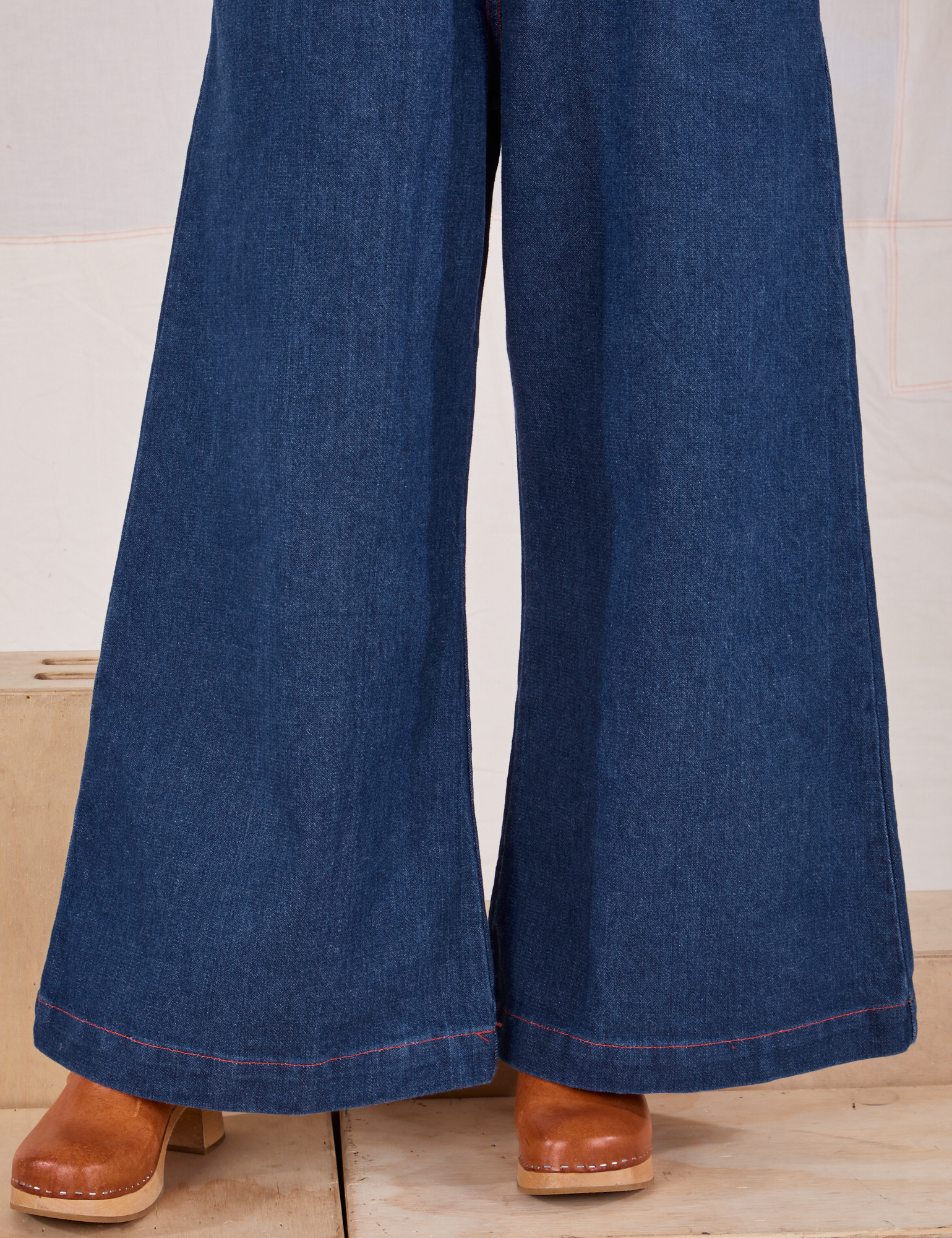 Indigo Wide Leg Trousers in Dark Wash pant leg close up on Hana