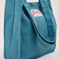Angled view of Shopper Tote Bag in Marine Blue