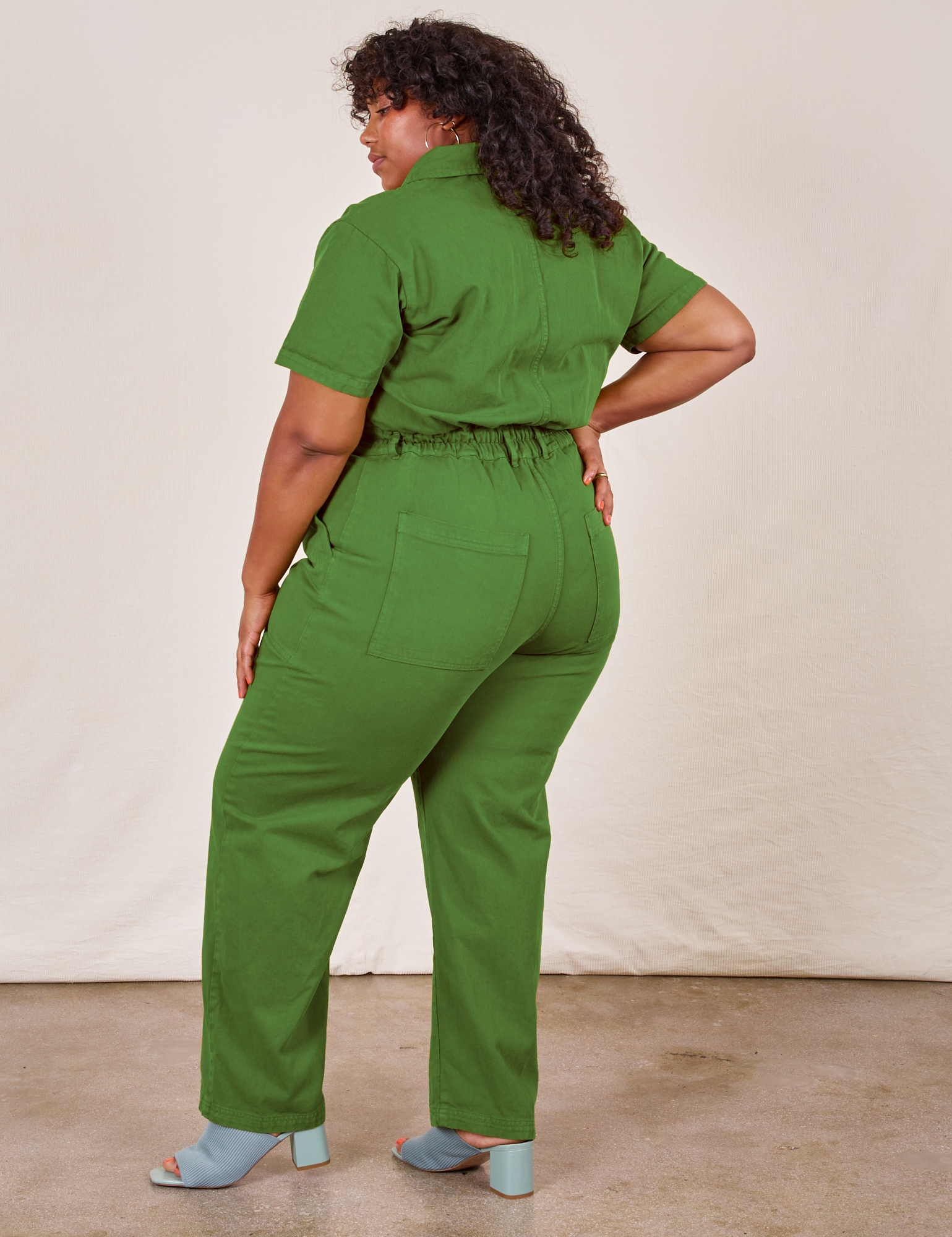 Back view of Short Sleeve Jumpsuit in Lawn Green worn by Morgan