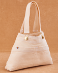 Overall Handbag in Vintage Off-White angled view