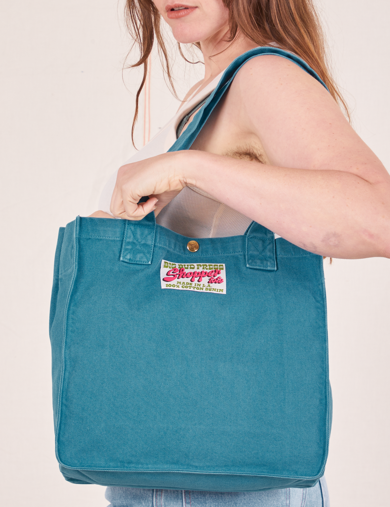Shopper Tote Bag in Marine Blue worn over shoulder on Allison