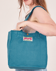 Shopper Tote Bag in Marine Blue worn over shoulder on Allison