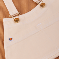 Overall Handbag in Vintage Off-White. Brass sun baby buttons and hardware