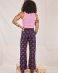 Back view of Western Pants in Purple Tile Jacquard and bubblegum pink Cropped Tank Top on Jesse