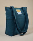 Angled view of Over-Shoulder Zip Mini Tote in Lagoon