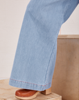Indigo Wide Leg Petite Trousers pant leg close up on Hana