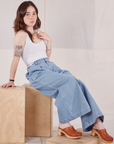 Hana is wearing Indigo Wide Leg Petite Trousers and vintage tee off-white Cropped Tank