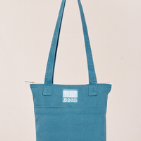 Over-Shoulder Zip Mini Tote in Marine Blue held by model