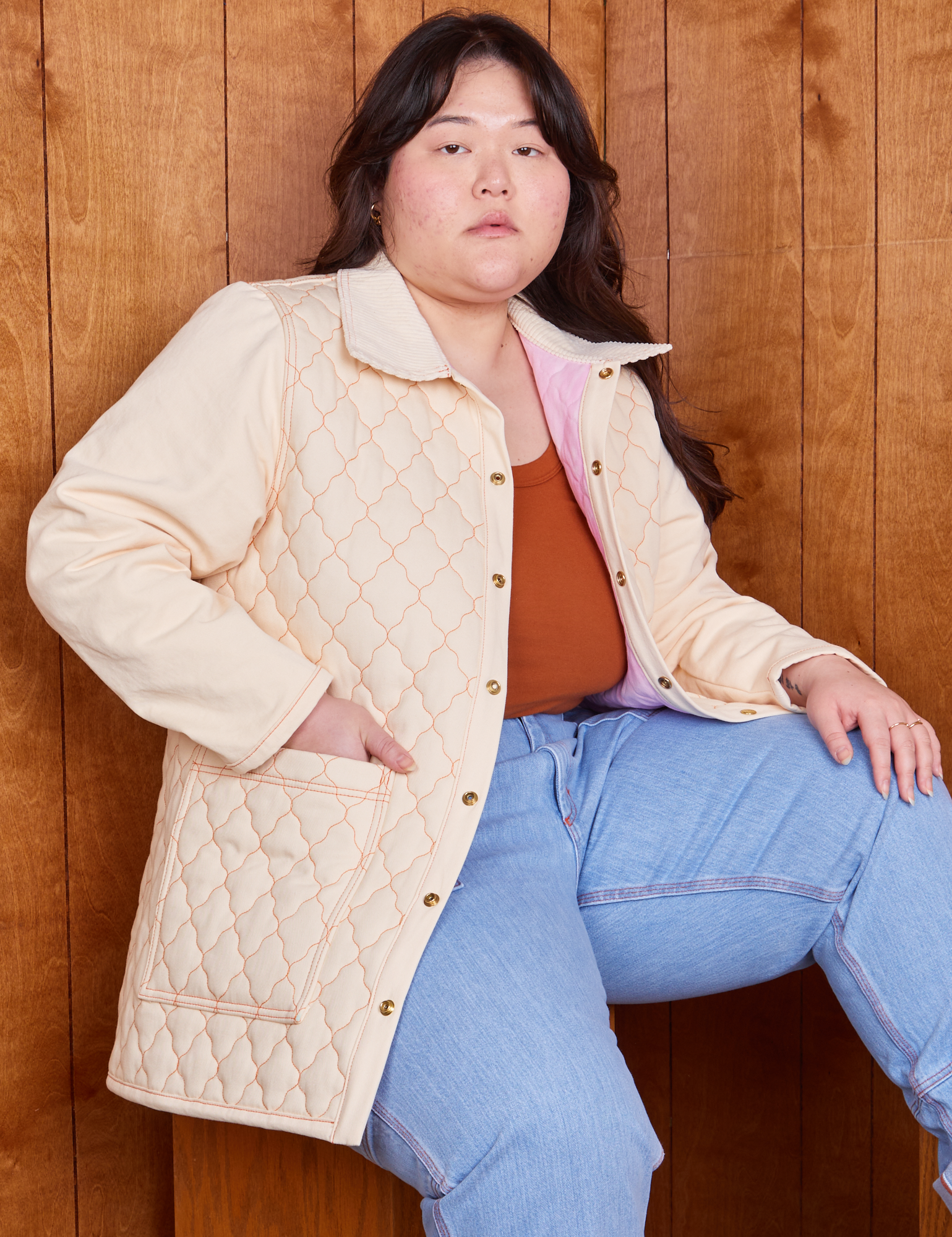 Ashley is wearing Quilted Overcoat in Vintage Off-White