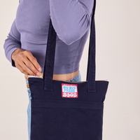 Over-Shoulder Zip Mini Tote in Navy worn on shoulder