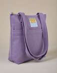 Angled view of Over-Shoulder Zip Mini Tote in Faded Grape