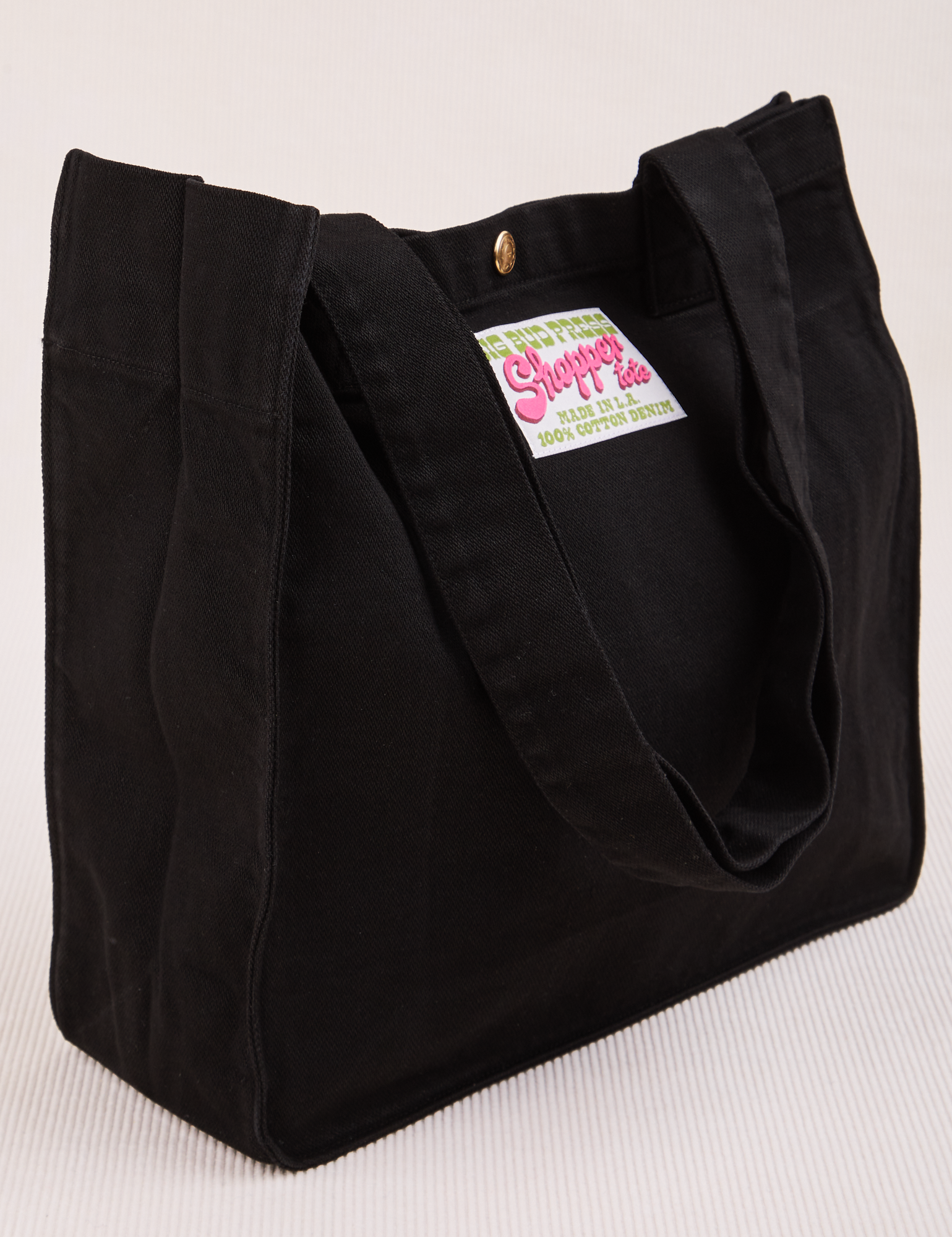 Angled view of Shopper Tote Bag in Black