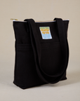 Angled view of Over-Shoulder Zip Mini Tote in Basic Black